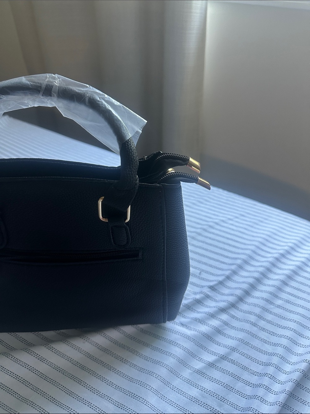 Black structure Macy’s brand full Leather hand back